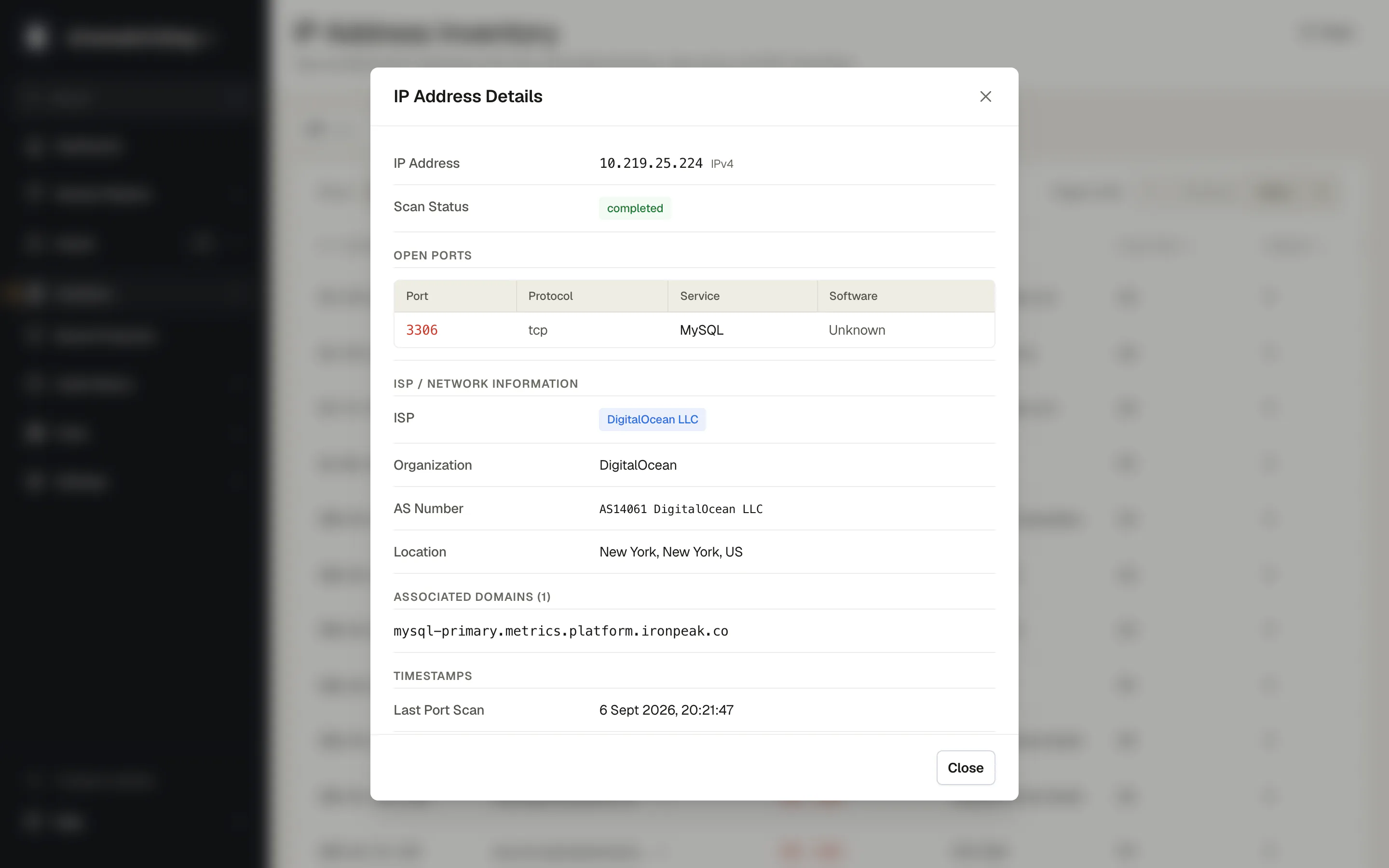 IP Address Details panel for a single address showing scan status, open ports, ISP and autonomous system, location, and the DNS records that resolve to it.
